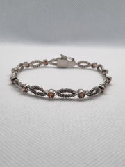 Silver Bracelet With Champagne And White Zircon