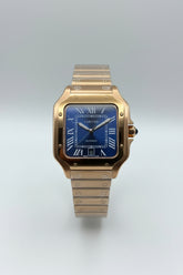 The "Classic Santos" Rose Gold & Sunburst Navy Steel Bracelet