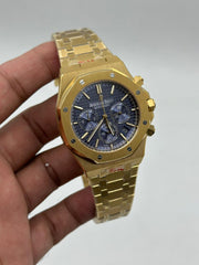 The "Classic Oak Chronograph" Yellow Gold & Sunburst Navy Tapisserie Bracelet