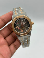 The "Classic Oak Double Balance Wheel Skeleton" Two-Tone Rose Gold & Openworked Steel Bracelet