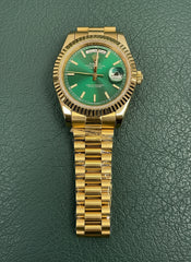 Day-Date 40 yellow gold color Green Roman dial
