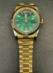 Day-Date 40 yellow gold color Green Roman dial