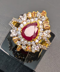 Royal Pear-Cut Ruby Ring with Sunburst Zirconia Halo | Time N Treasure