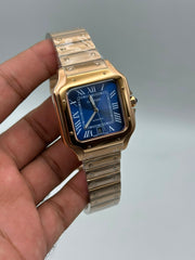 The "Classic Santos" Rose Gold & Sunburst Navy Steel Bracelet