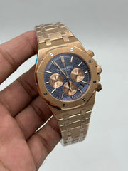 The "Royal Oak Chronograph" Rose Gold & Sunburst Navy Tapisserie Bracelet