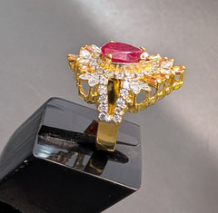 Royal Pear-Cut Ruby Ring with Sunburst Zirconia Halo | Time N Treasure